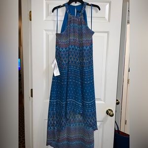 High low sleeveless dress.